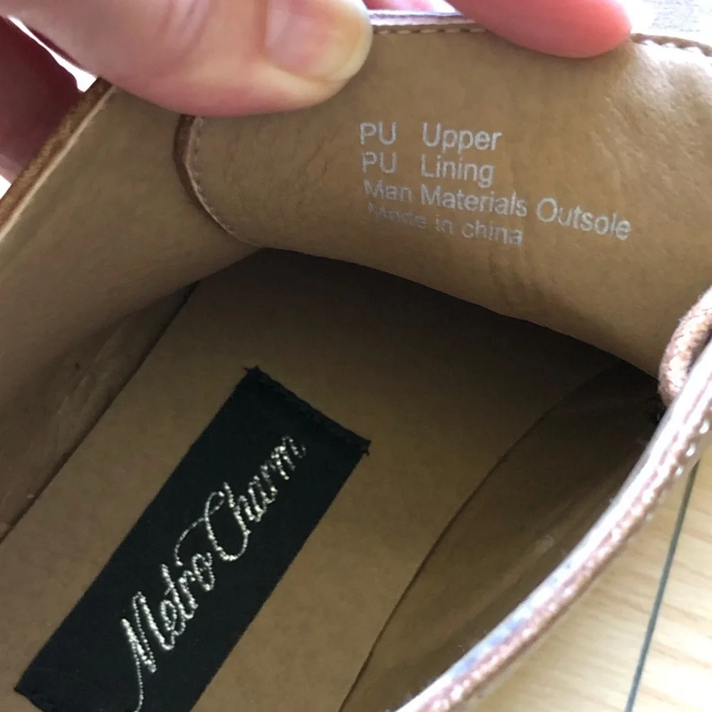 metro charm. Brown lace up booties